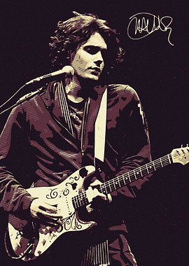 John Mayer playing guitar on stage