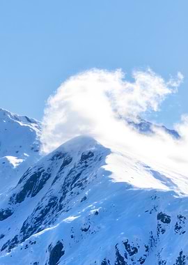Snowy Mountain Peak with Cloud