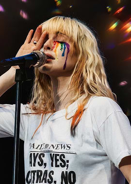 Hayley Williams performing with rainbow tears