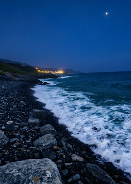 Night Coastline with Waves and City Lights