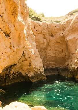 Coastal Cliff and Turquoise Water