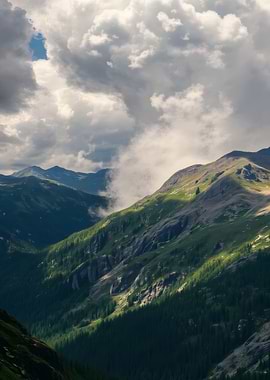 Mountain Landscape with Clouds and Sunlight