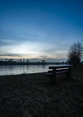 Bench by Frozen Lake at Dusk