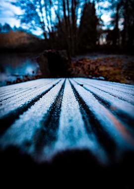 Frosty Wooden Planks by a Lake