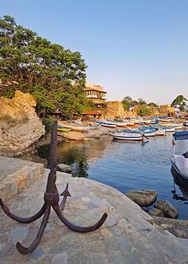Coastal Harbor with Boats and Anchor