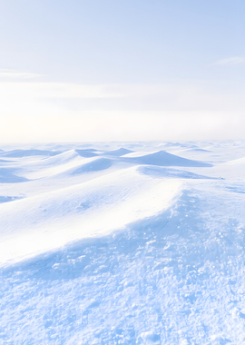 Snowy landscape with drifts and sky