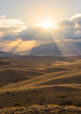 Sun Rays Over Rolling Hills Landscape