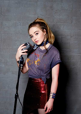 Sabrina Carpenter with microphone