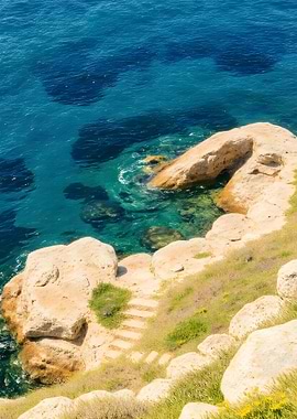 Coastal Rocks and Azure Sea