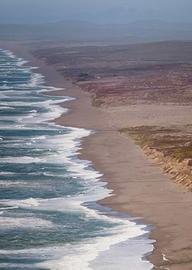 Coastal landscape with waves and dunes