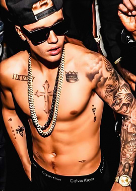 Justin Bieber shirtless with tattoos