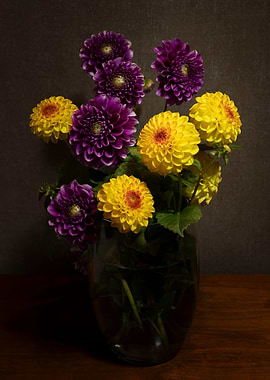 Vase of Purple and Yellow Dahlias