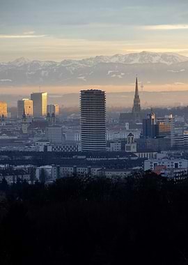 Cityscape with Mountains at Sunset
