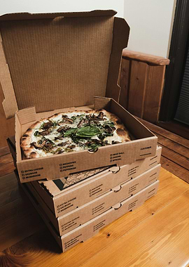 Stack of Pizza Boxes with Open Top Pizza