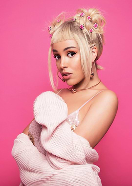 doja cat american with pink hair buns and sweater