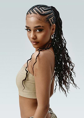 tyla with braided ponytail and crop top
