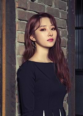 sua korean singer with Red Hair and Black Dress