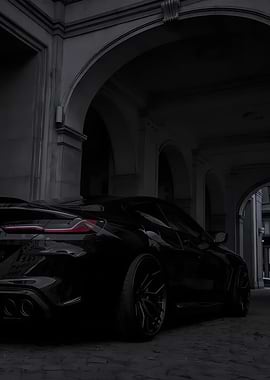 Black Sports Car in Arched Alley