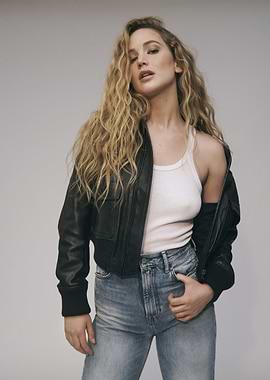 Jennifer Lawrence in a leather jacket and jeans
