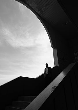 Man in Suit on Stairs
