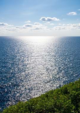 Sunlight Shimmering on Vast Blue Ocean