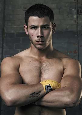 Nick Jonas with boxing wraps