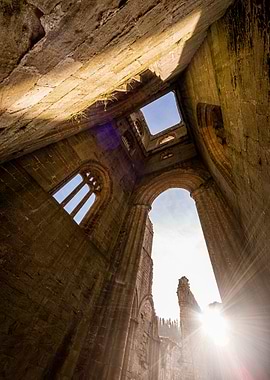 Ruined Abbey Interior with Sunlight