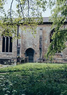 Ancient Church Entrance with Overgrown Garden