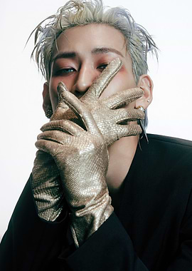 bambam with gold gloves and makeup