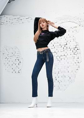 Lisa in black crop top and jeans