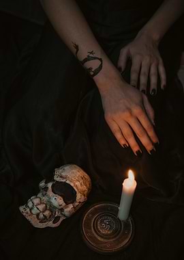 Mysterious scene with skull and candle