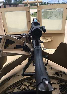Machine Gun Mounted in Military Vehicle