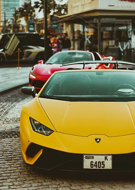 Yellow Lamborghini and Red Sports Car