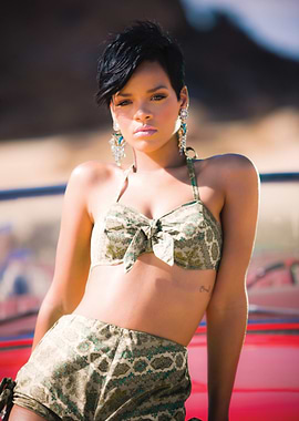 Rihanna in a patterned bikini and shorts