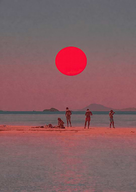 People on a beach at sunset