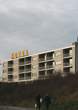 Hotel building with people walking