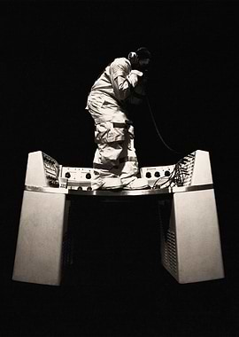 Man on vintage electronic equipment