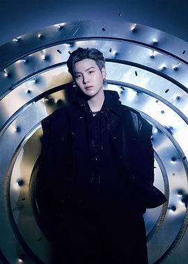 Suga of BTS in dark attire