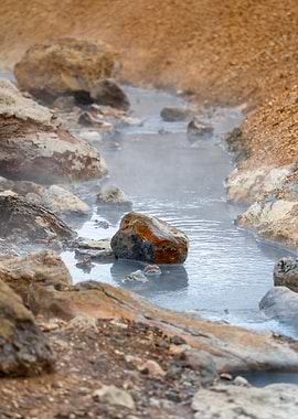 Steaming Geothermal Stream with Rocks
