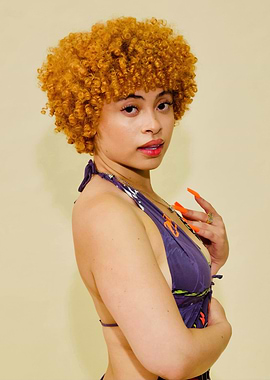 Ice Spice in a Purple Halter Dress