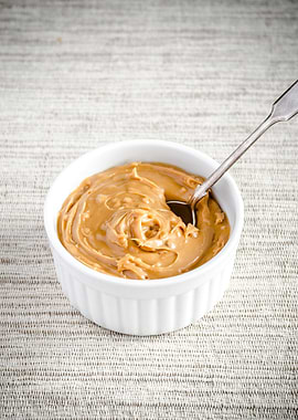 Peanut Butter in a Bowl with Spoon