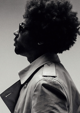 brent faiyaz with Afro and Trench Coat