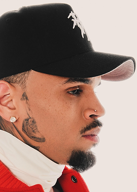 Chris Brown in Black Cap and Red Jacket