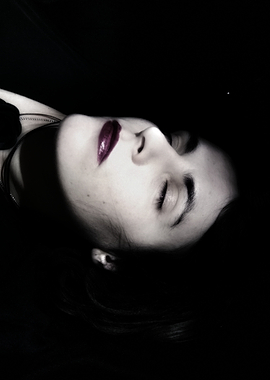 Woman with Dark Lipstick in Shadow