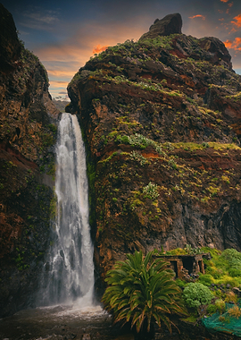 Majestic Waterfall in a Rocky Canyon, Portugal island