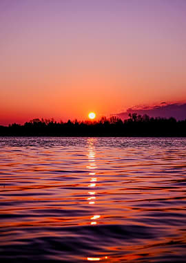 Sunset over a calm lake
