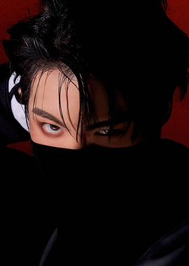 ateez with intense gaze and black mask