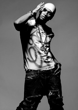 Usher in Ripped Jeans and Beanie