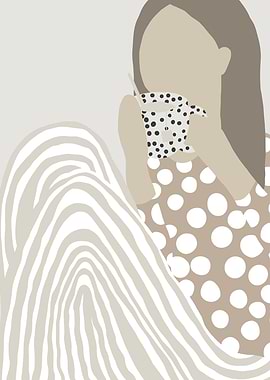 Woman drinking coffee with polka dots