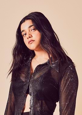 iman vellani in Sheer Metallic Shirt